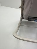 Bujaczek leżaczek Maxi-Cosi Kori 2 w 1 z łukiem z zabawkami beige